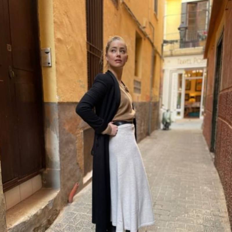 <span style='color:#780948'>ARCHIVED</span> - Amber Heard seeks Spanish solitude after infamous legal battle with Johnny Depp