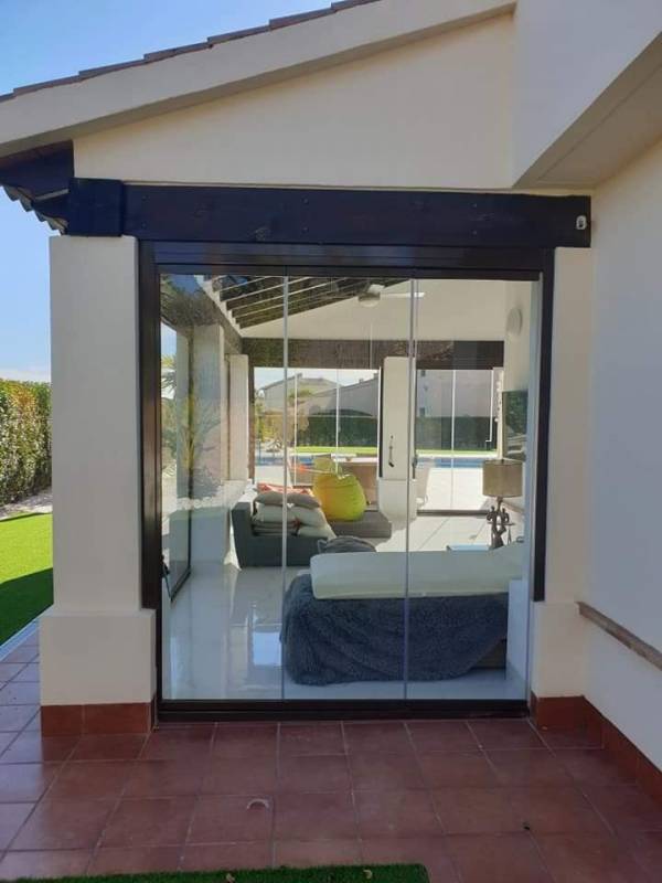 Make your outdoor space part of your living area with glass curtains from Home Space Group