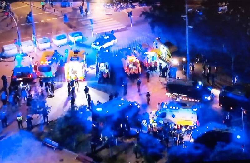 13 people injured as car mows into crowd at Barcelona football match